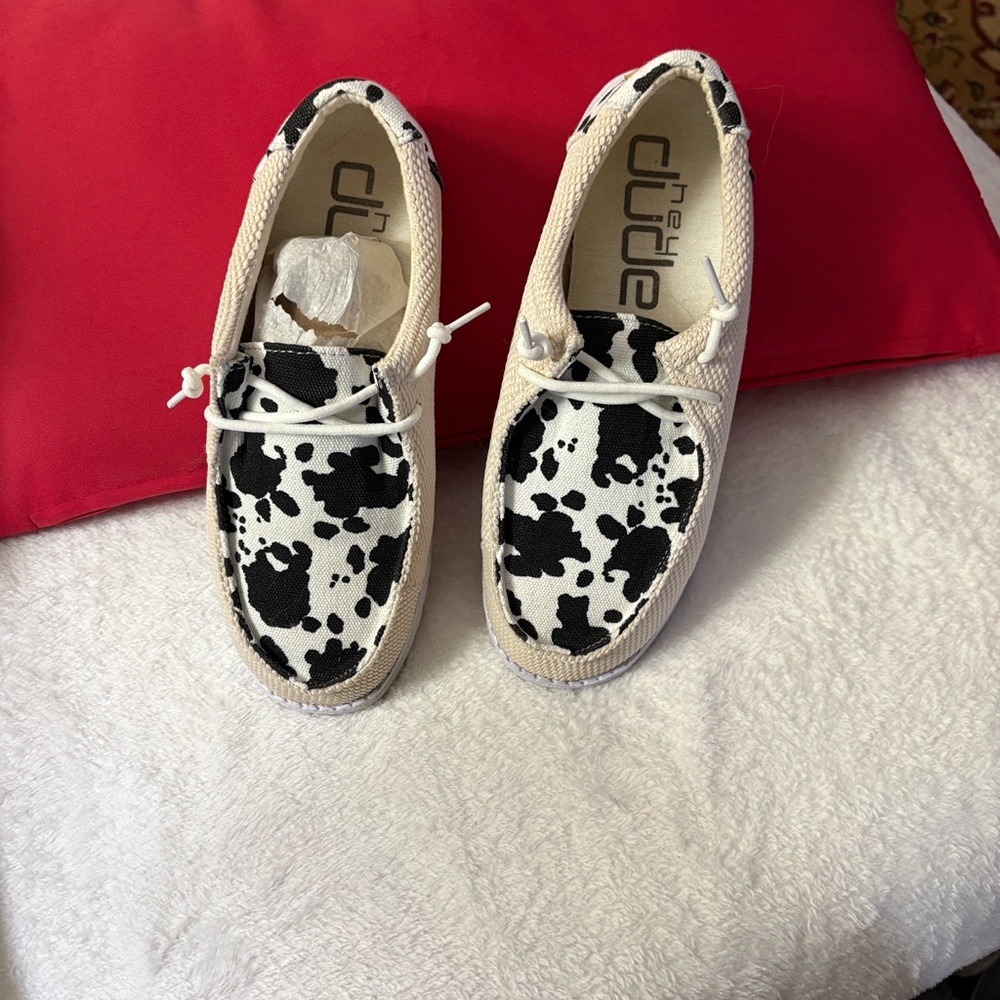 Hey Dude Womens Black and White loafers.